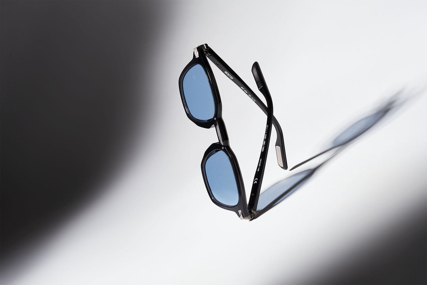 AC04 Black with Blue Lenses